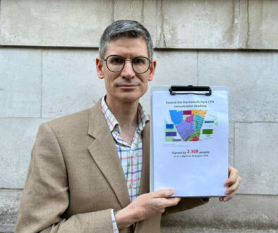 Andrew with petition 16x9